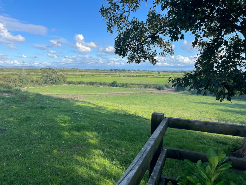 Rolling fields behind the cottage.