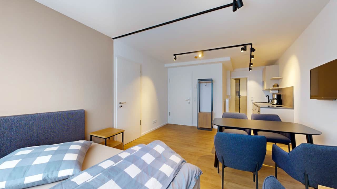 Gemütliches Schlafzimmer mit Doppelbett im N°8A Boardinghouse