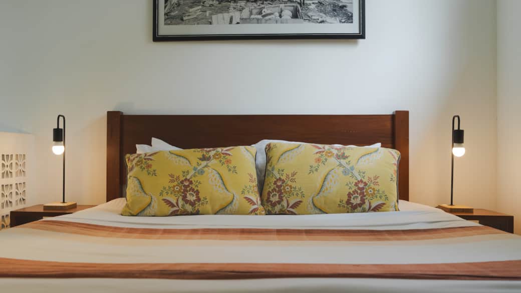 King bed. Extra pillows and a light blanket in the wardrobe.