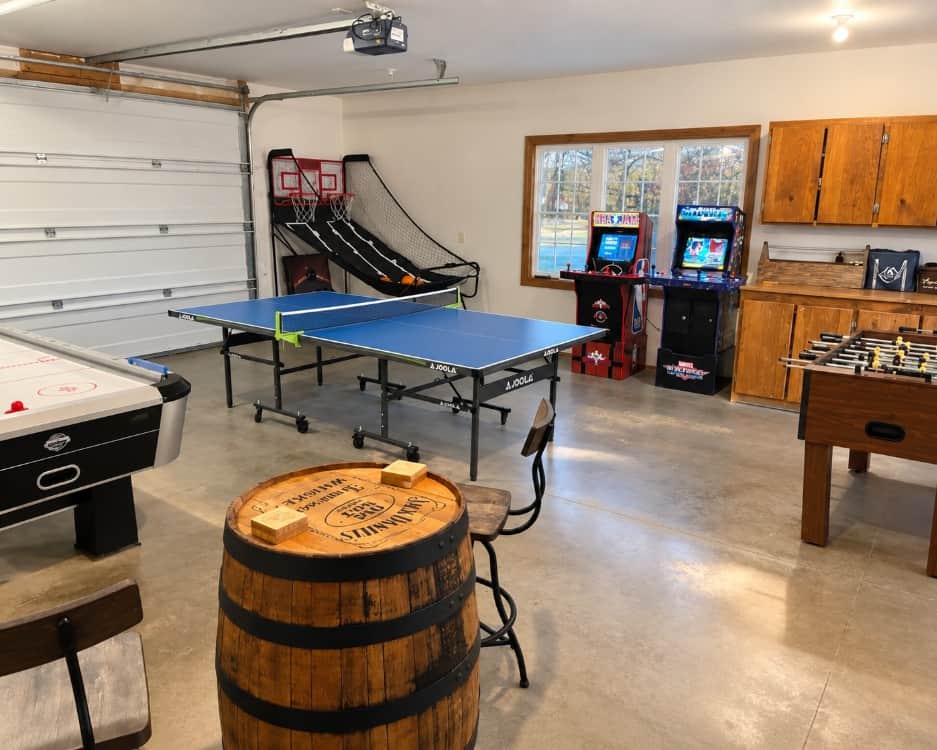 Games room with pool table, air hockey, ping pong, foosball, and basketball shootout arcade games as