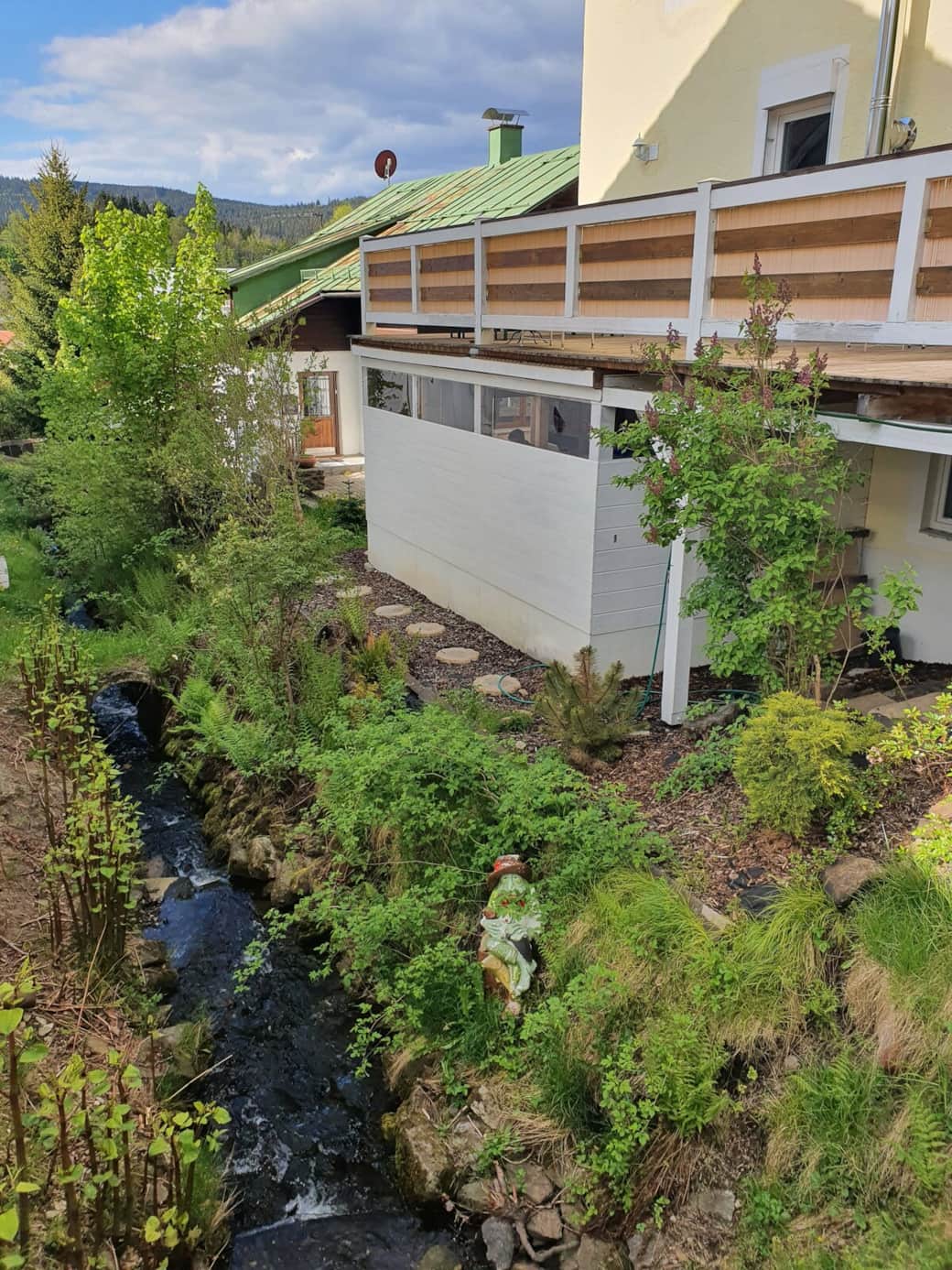 Stream next to house Stream next to house