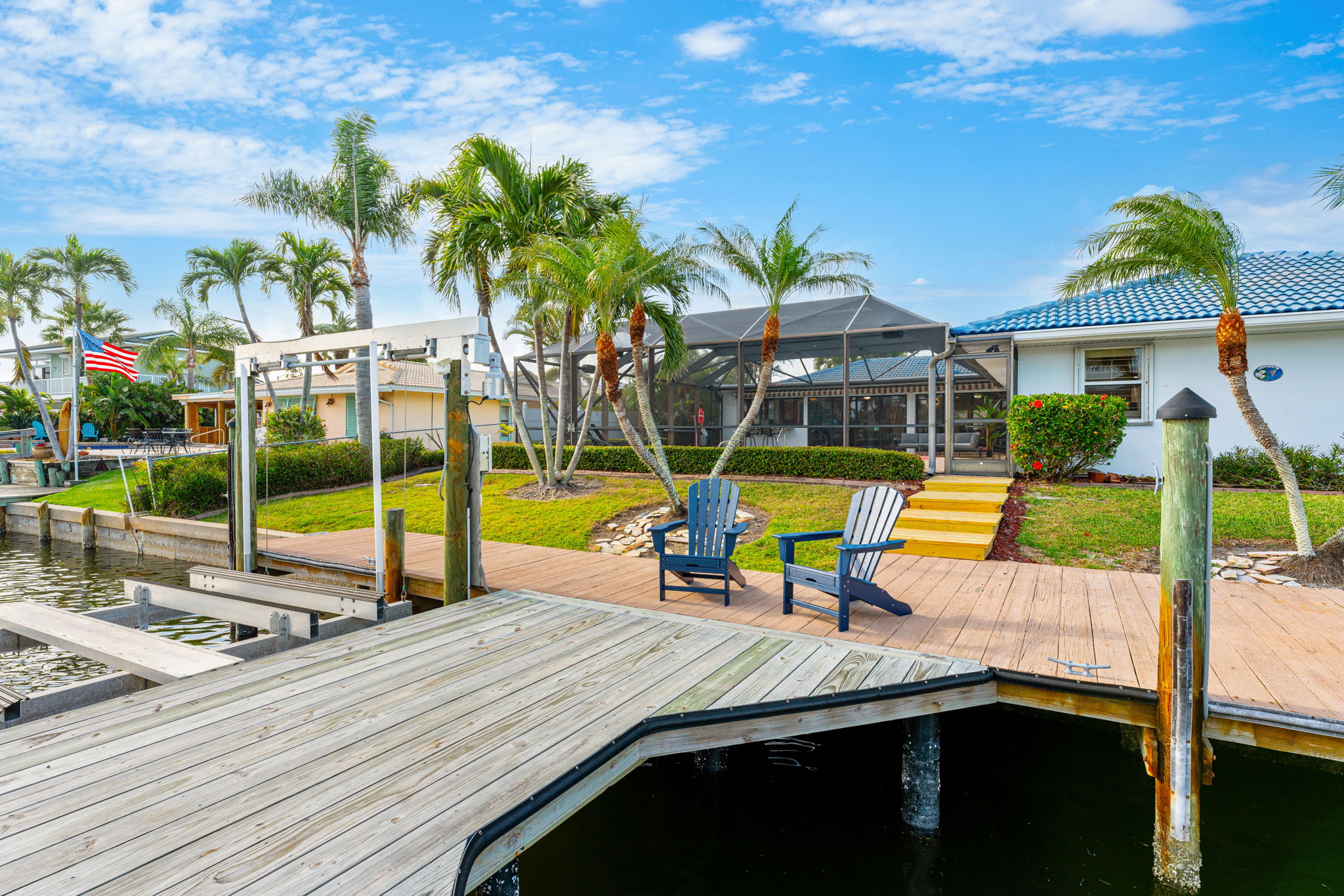 Sit back and relax by the water’s edge, taking in the peaceful canal views from the dock.