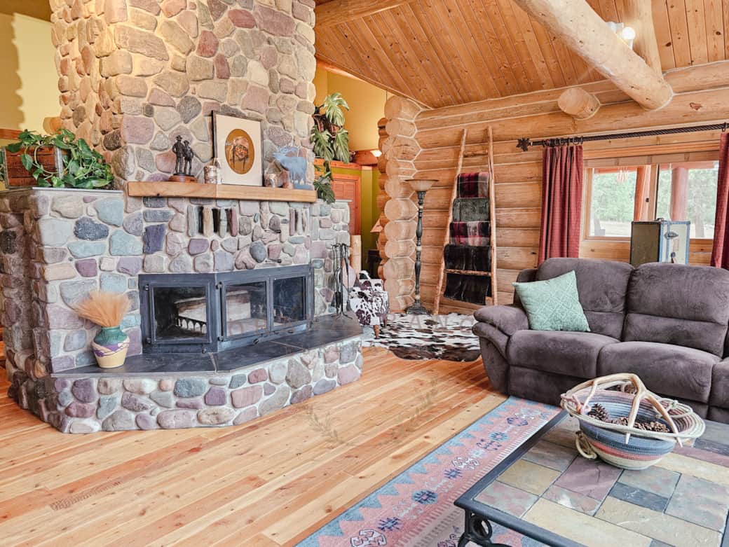 River Rock Living Room: Queen size couch bed, tv, fire place, reading nook, & puzzle table. River Rock Living Room: Queen size couch bed, tv, fire place, reading nook, & puzzle table.