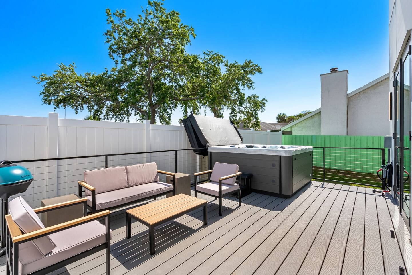Relax on the private backyard complete with a hot tub for ultimate enjoyment.