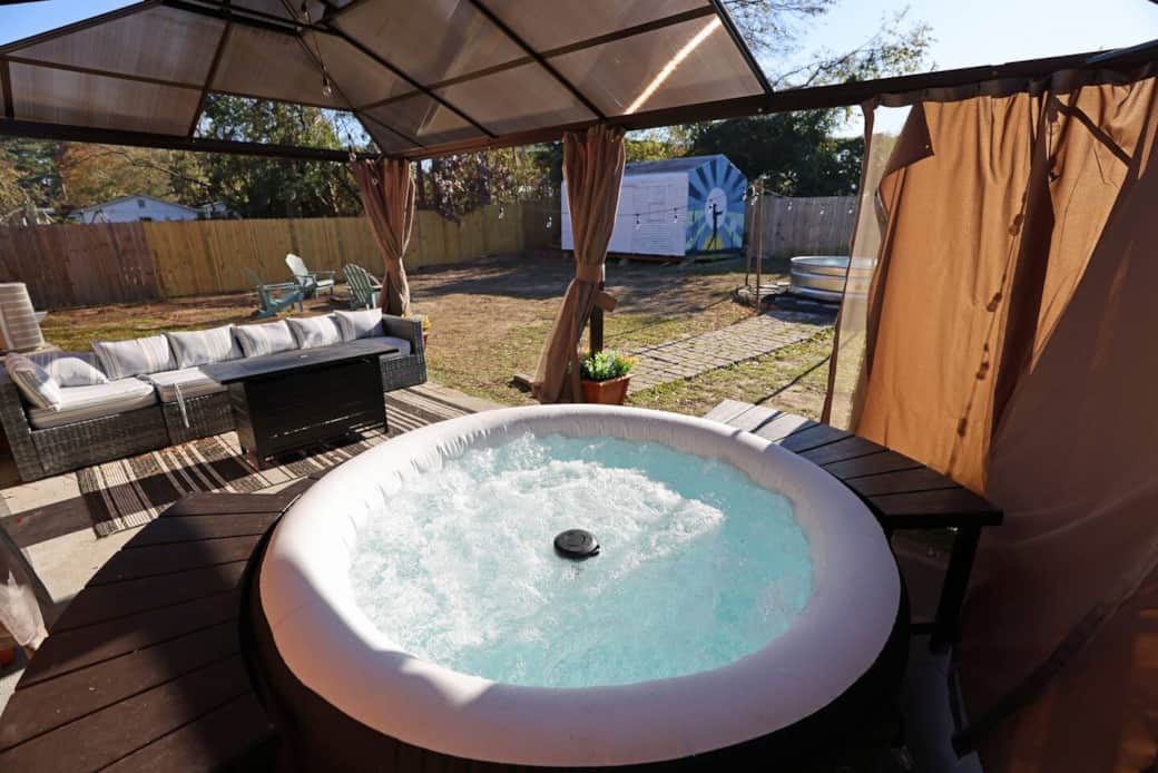 Your stay includes this inviting hot tub—perfect for day or night.