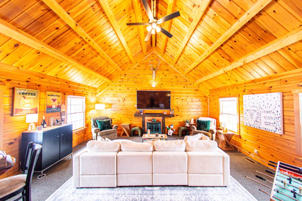 Huge living room with bar and card table
