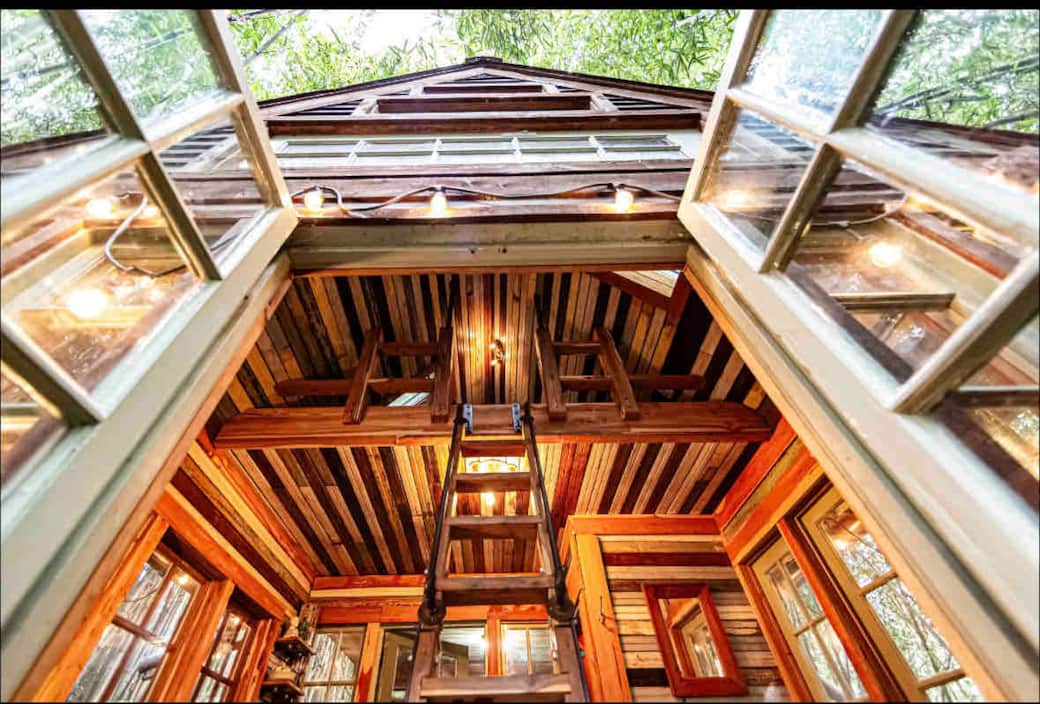Shot by Joy Cannis of the gorgeous multi colored beaded board of the treehouse, looking up into the loft. Shot by Joy Cannis of the gorgeous multi colored beaded board of the treehouse, looking up into the loft.