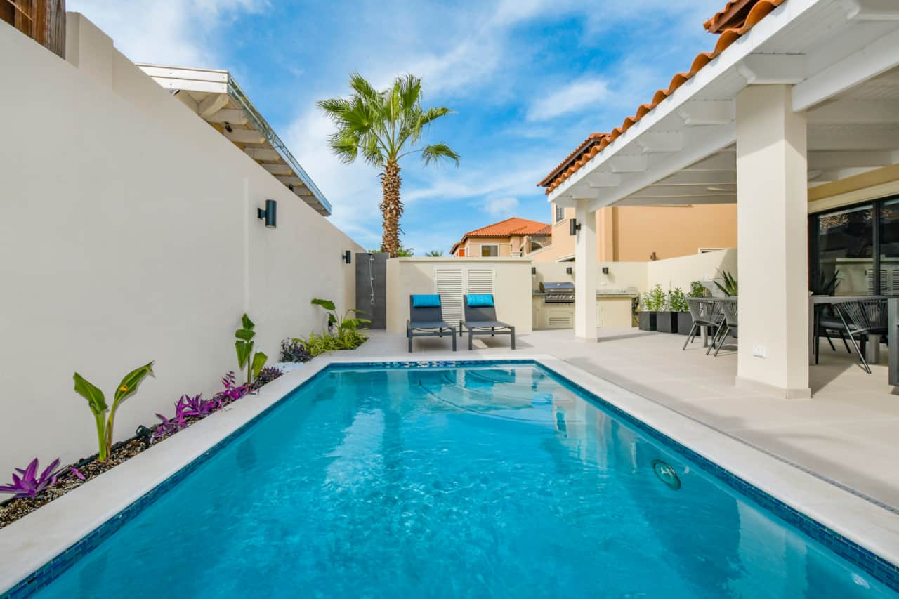 private pool in fully-enclosed backyard