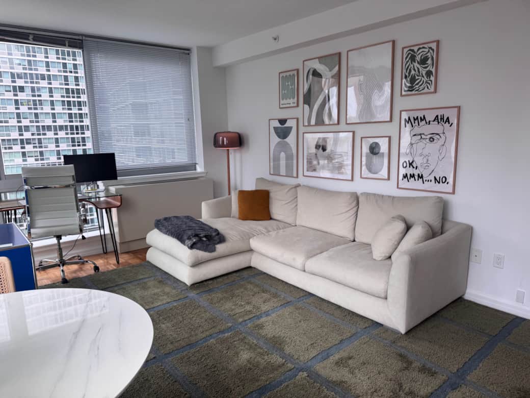 Bright, modern space with floor-to-ceiling windows.