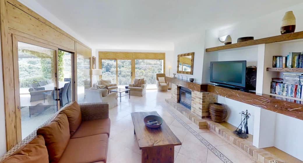living room with bright large windows all around making the most of the incredible views 