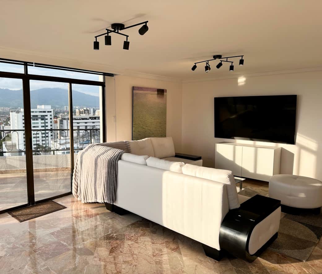 Enjoy our 75" Samsung streaming TV. All the windows have blinds for maximum visibility, 
