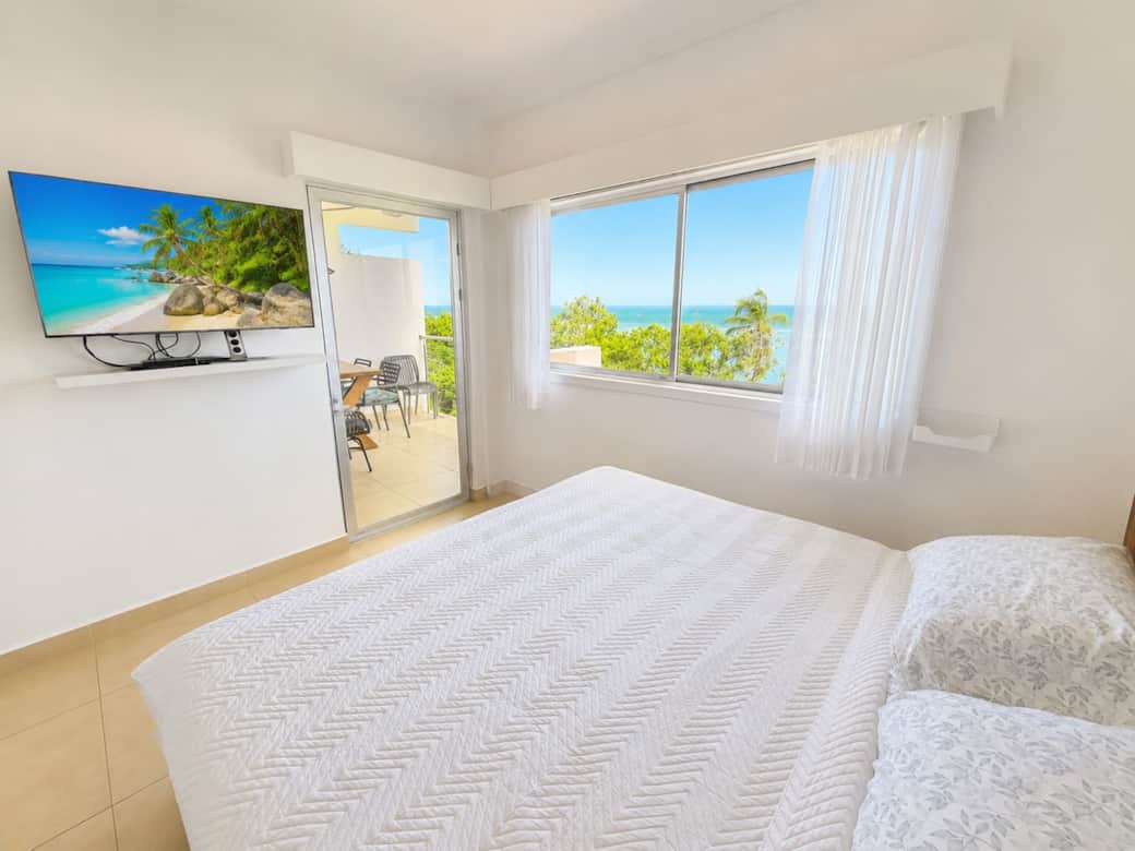 Enjoy the Sounds of the Ocean and the Macaws from the King Bed Suite
