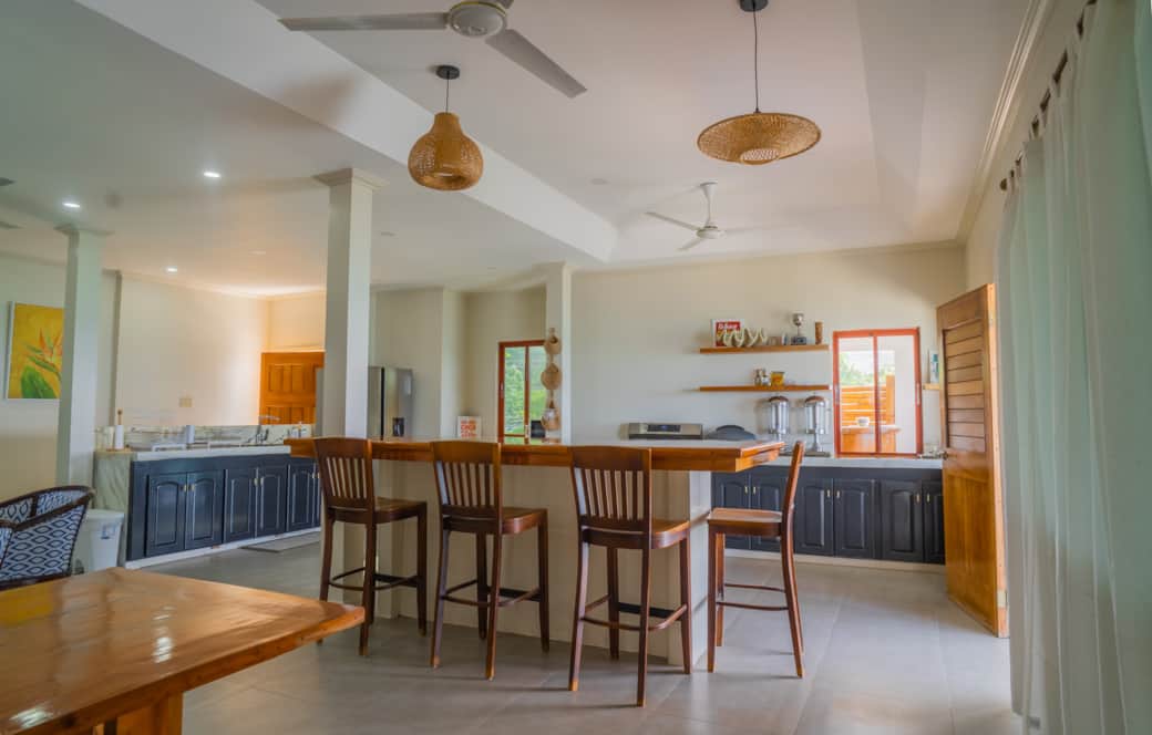 Driftwood Suite indoor dining + kitchen Driftwood Suite indoor dining + kitchen
