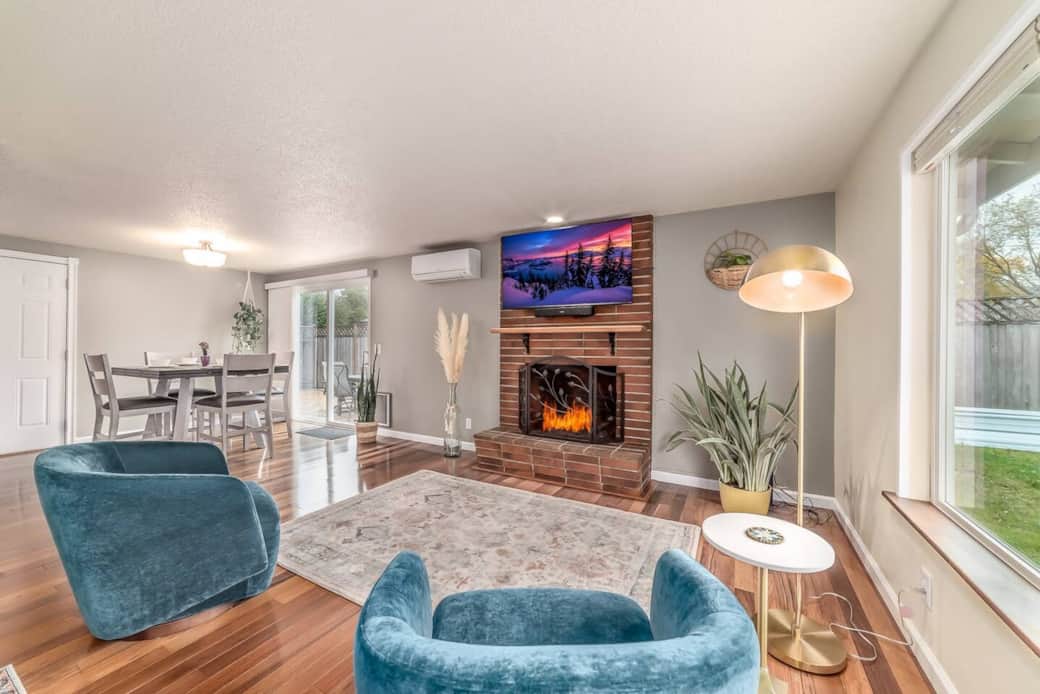 Living room and dining room combo. 50 inch 4K TV with Xfinity Flex Streaming box. Dining room table and chairs and a pair of 360 degree swivel chairs. Fireplace is for decoration only - please do not use fireplace to burn wood. Living room and dining room combo. 50 inch 4K TV with Xfinity Flex Streaming box. Dining room table and chairs and a pair of 360 degree swivel chairs. Fireplace is for decoration only - please do not use fireplace to burn wood.