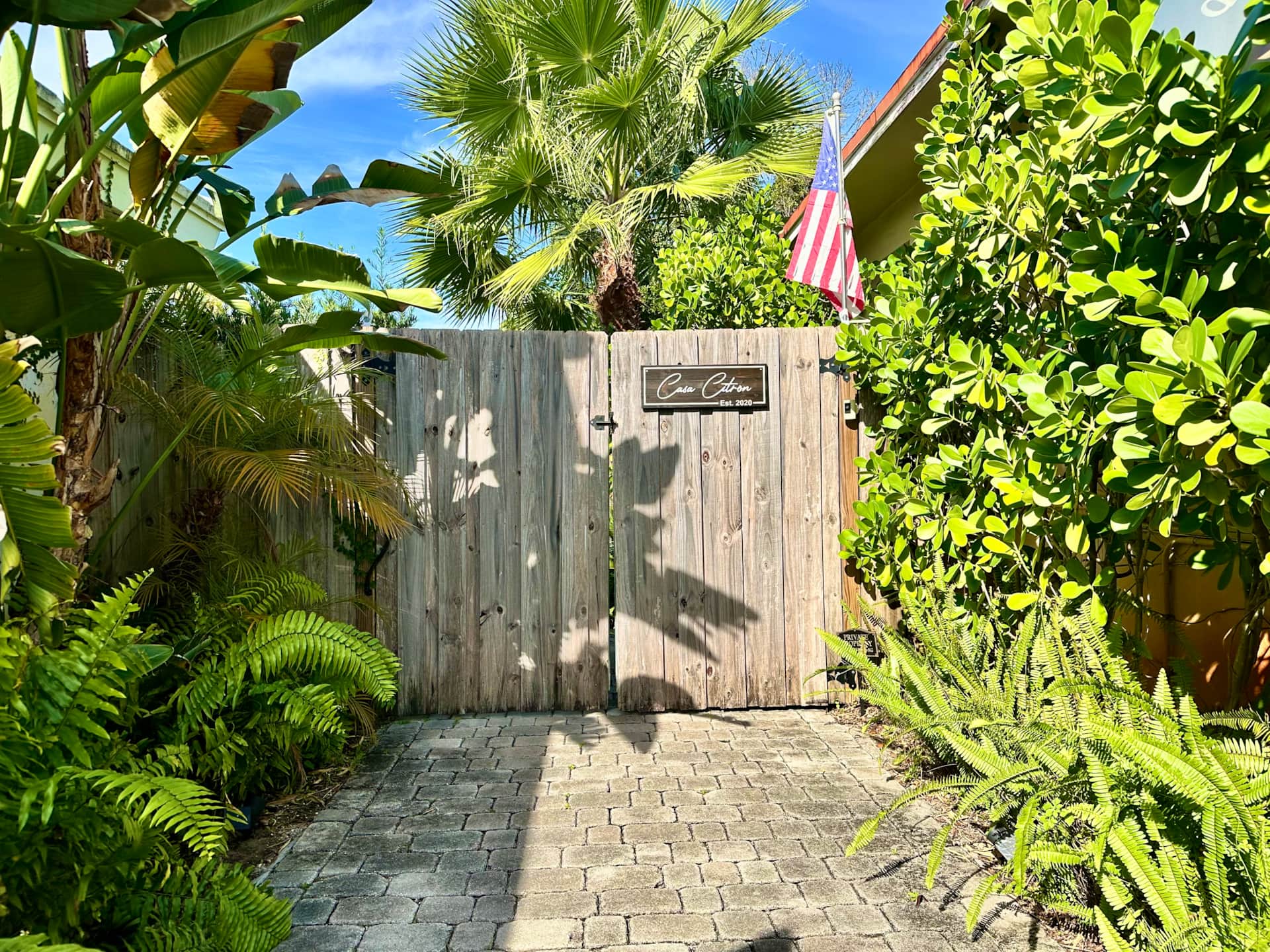 Renovated entry gate at Casa Citron featuring a private, enclosed courtyard entrance that clearly marks arrival and provides security and privacy.