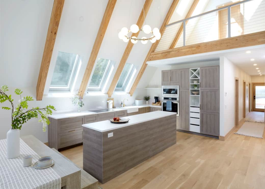 A culinary workspace featuring custom cabinetry.