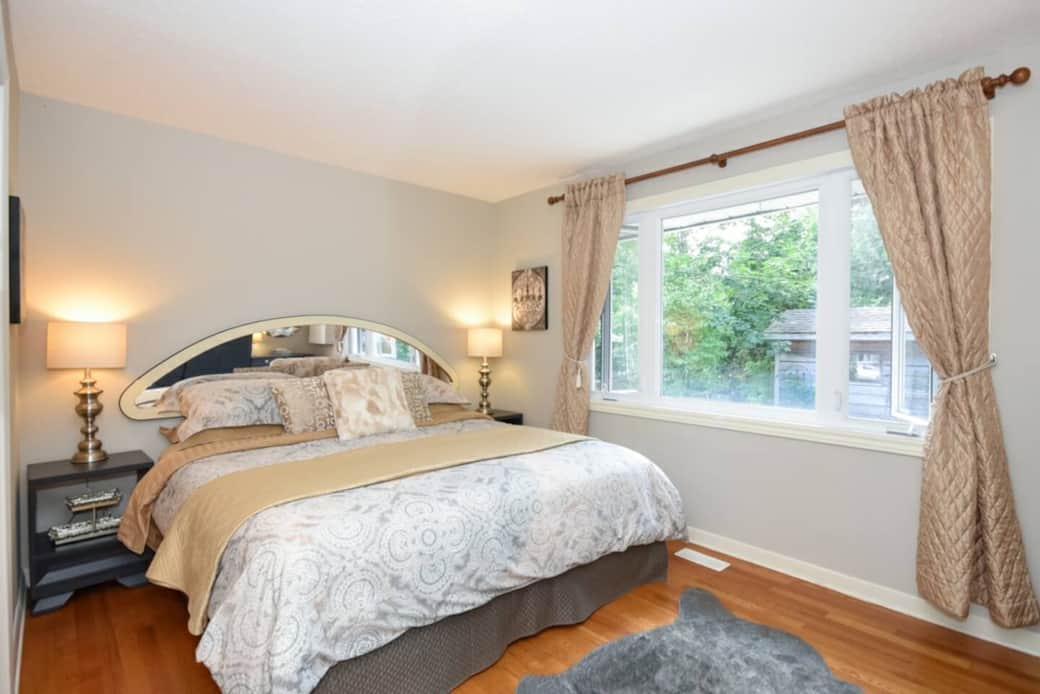 The primary suite features premium linens and ensuite bathroom with room darkening drapes.