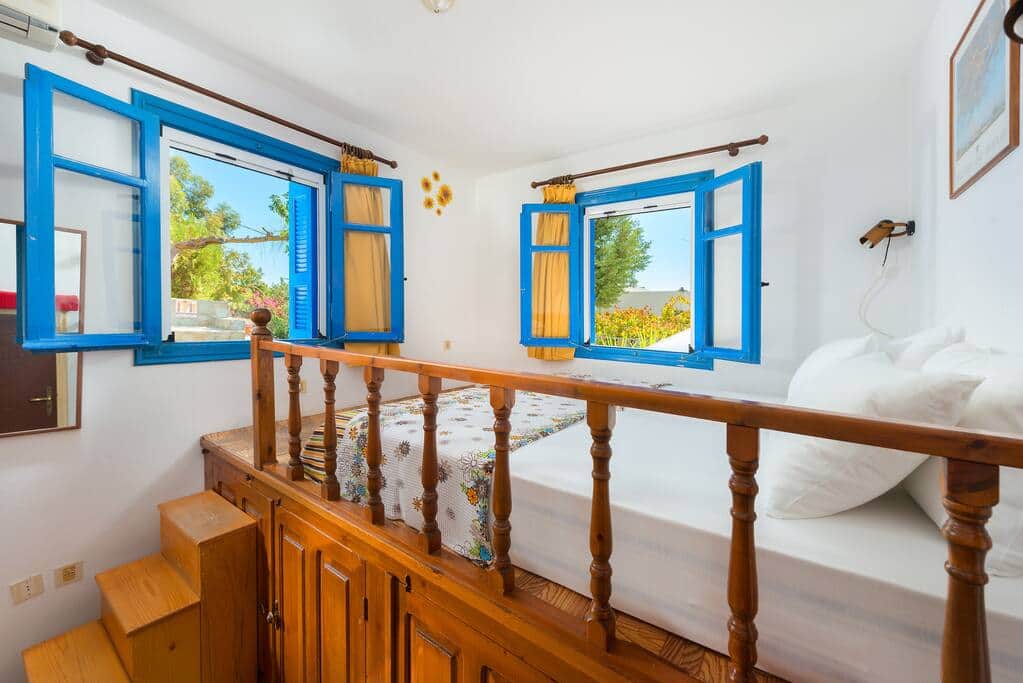 Bedroom with traditional Lindian style bed