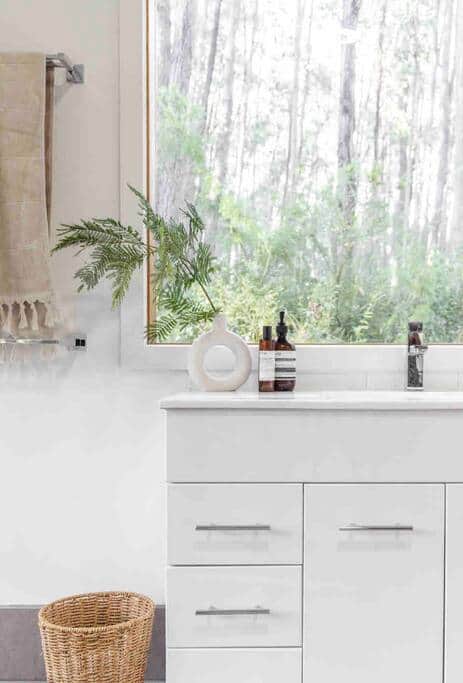Bathroom with forest views Bathroom with forest views