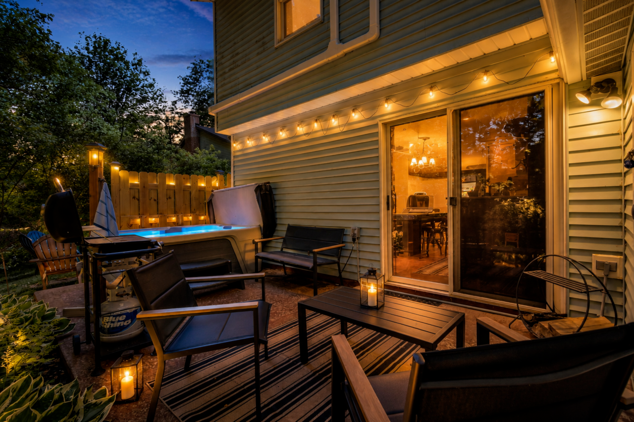Private hot tub patio for evening soaks under the café lights