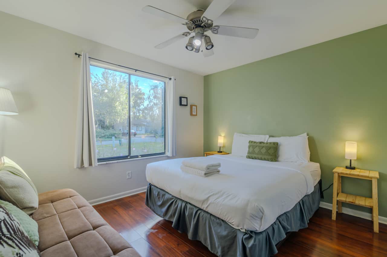Greenroom with comfortable queen bed and a very warm comforter