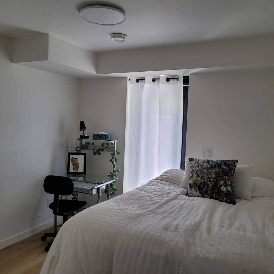 This is the second bedroom in the suite. Behind the door is another private patio. 