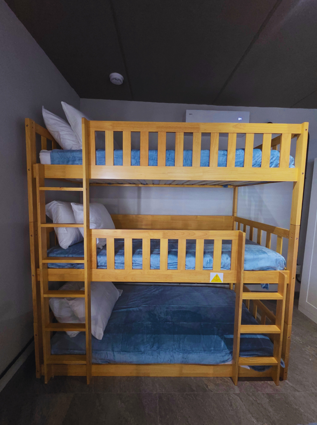 Family-friendly bunk bed for 3 with soft bedding and ample comfort. Treasure Island, FL