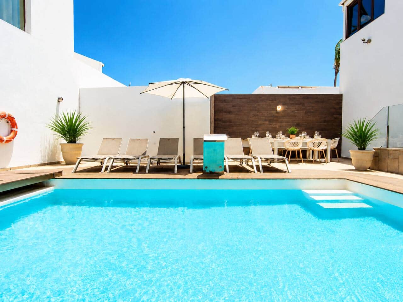 Heated pool and sun terrace at Villa Tisalaya, family villa in Puerto del Carmen