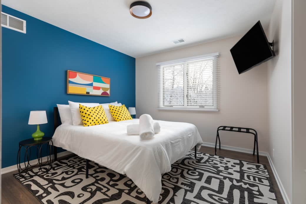 "Bedroom 9 with a comfy queen bed and a 43" flat-screen TV for ultimate relaxation!" "Bedroom 9 with a comfy queen bed and a 43" flat-screen TV for ultimate relaxation!"