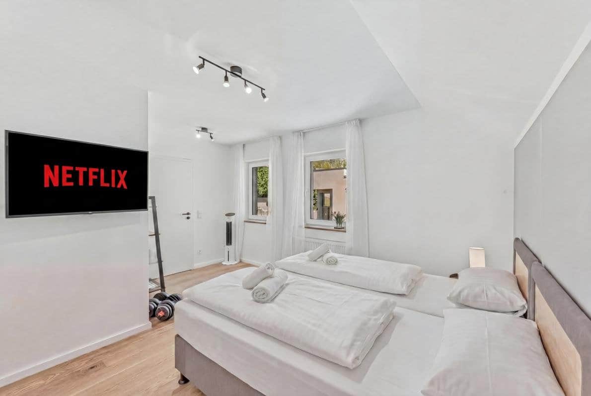 Helles Schlafzimmer mit Smart-V und Grünblick – als Doppelbett oder 2 Einzelbetten nutzbar