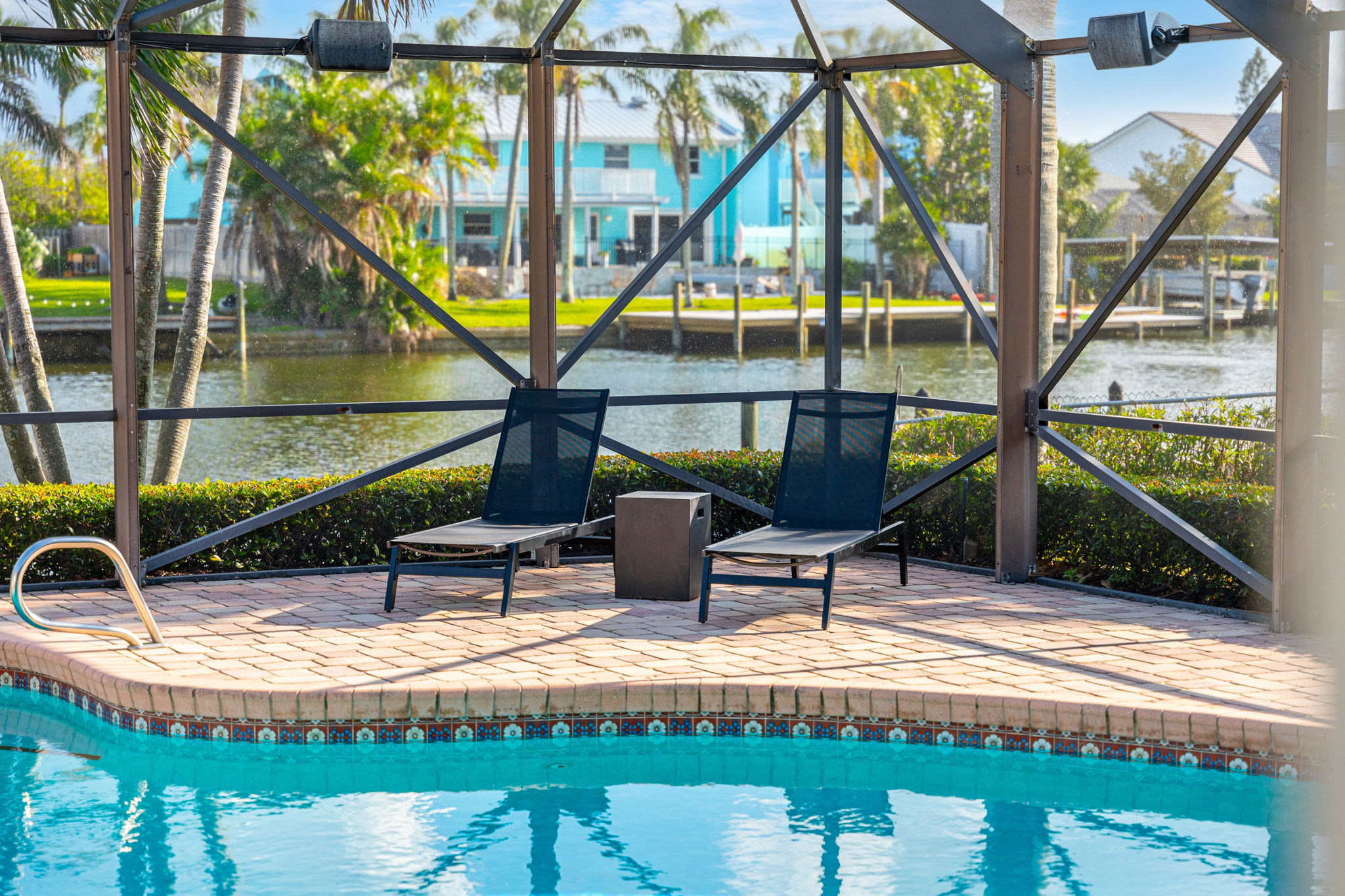 Unwind in this tranquil poolside, where you can soak up the sun and enjoy views of the canal.