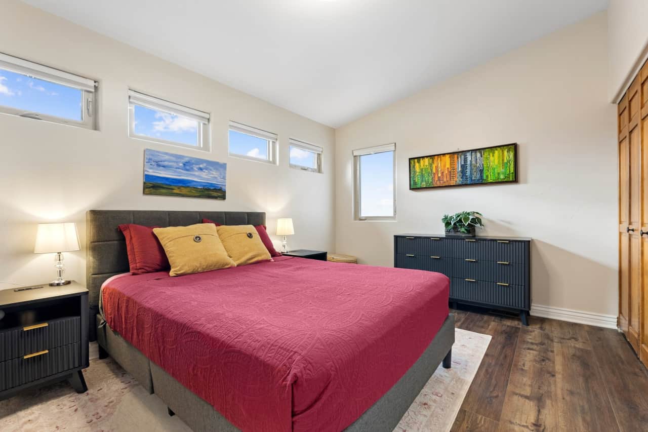 Queen bedroom with clerestory windows