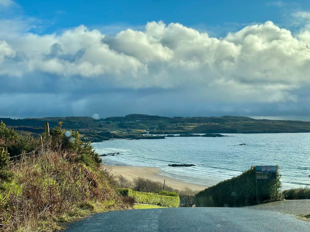 Panoramic ocean and mountain views overlooking Fintra Bay and the Donegal coast.