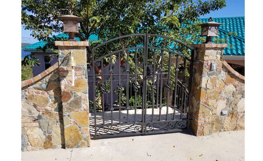 Front gate to keep the island donkeys and goats from rummaging through the garden 