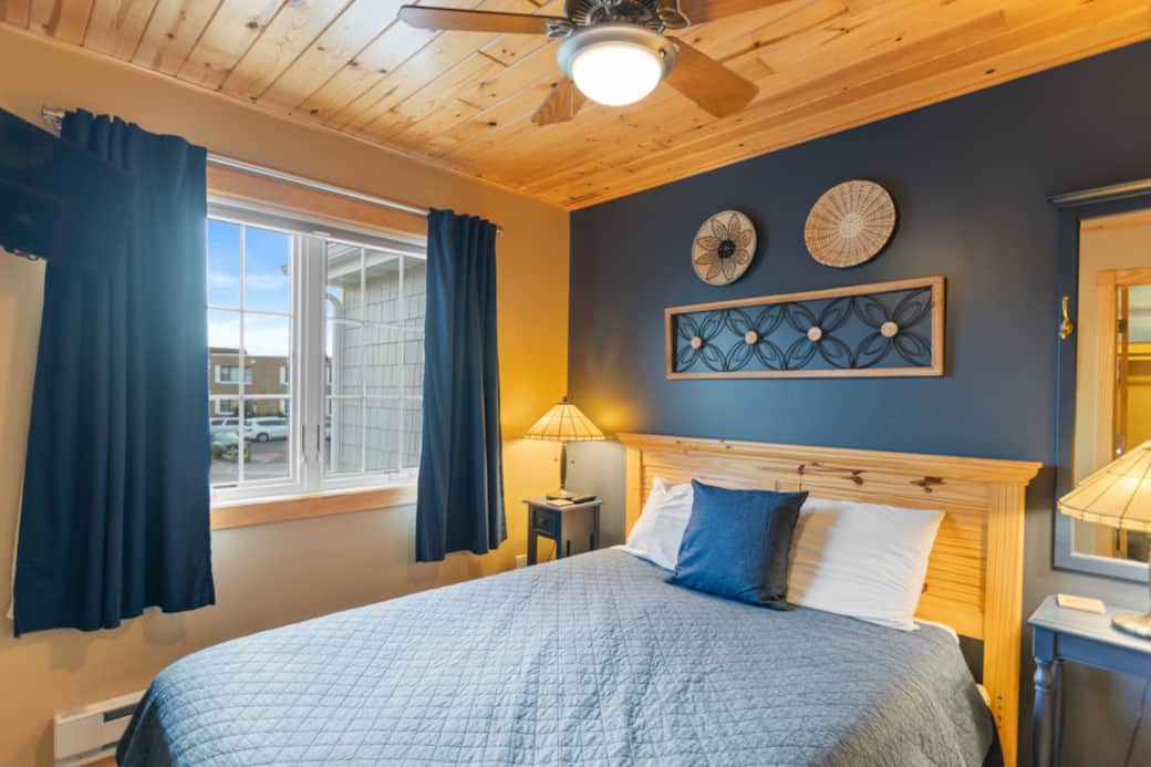 Secondary Bedroom - featuring a queen sized bed, with bathroom ensuite. 