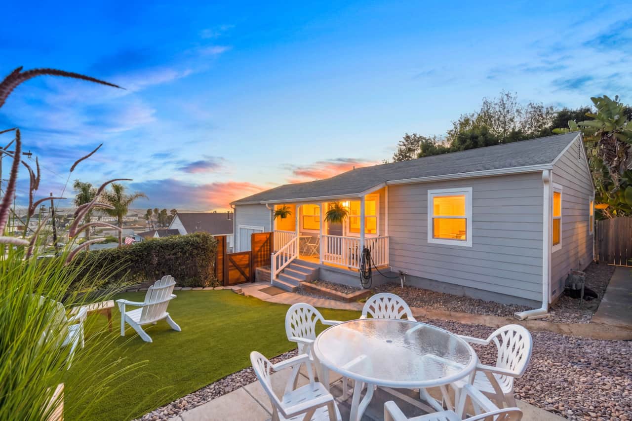 Enjoy outdoor dining and relaxing lawn space with scenic neighborhood views.