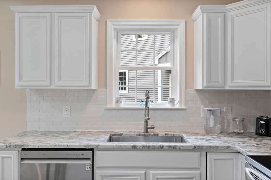 Large stainless steel sink with pulldown faucet