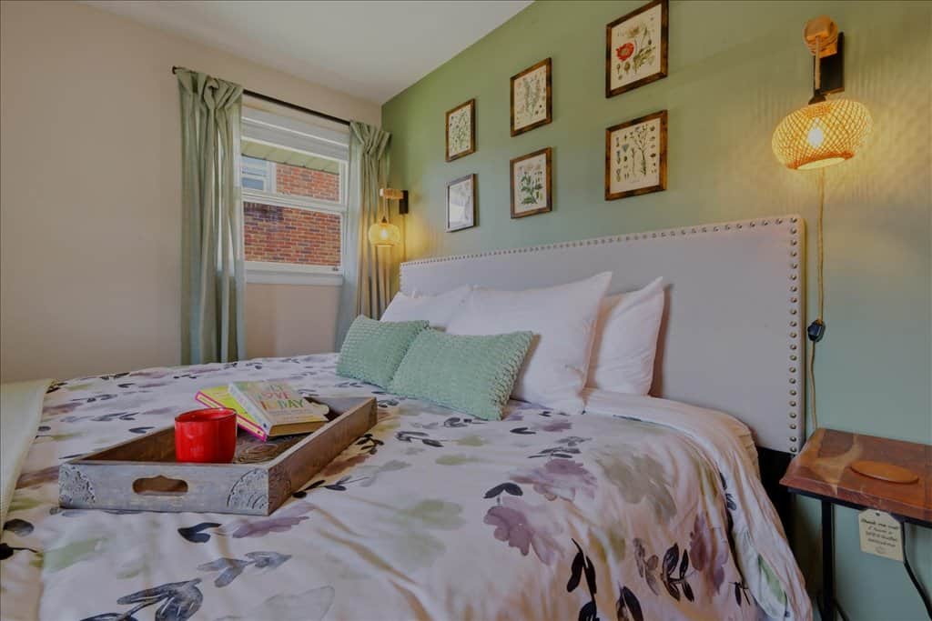 🌿 Botanical Room: king bed, morning coffee, and a good book — pure slow-morning bliss 🌿 Botanical Room: king bed, morning coffee, and a good book — pure slow-morning bliss