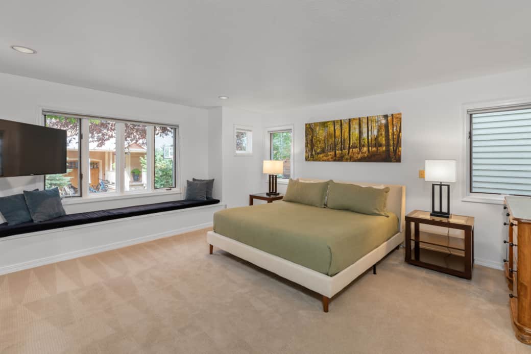 Primary bedroom features a king-sized bed Primary bedroom features a king-sized bed