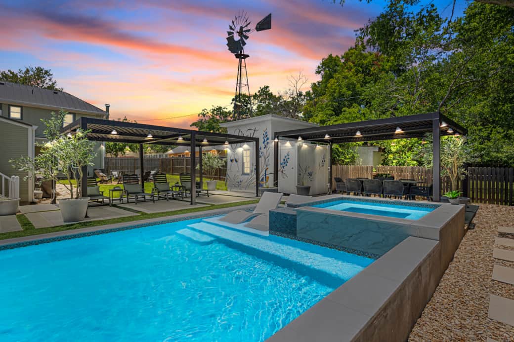 The backyard lights up at night for the perfect ambience. The backyard lights up at night for the perfect ambience.