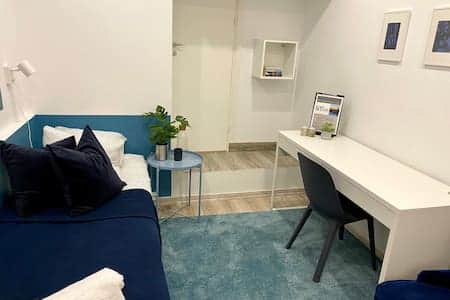 Two single beds and working space Two single beds and working space