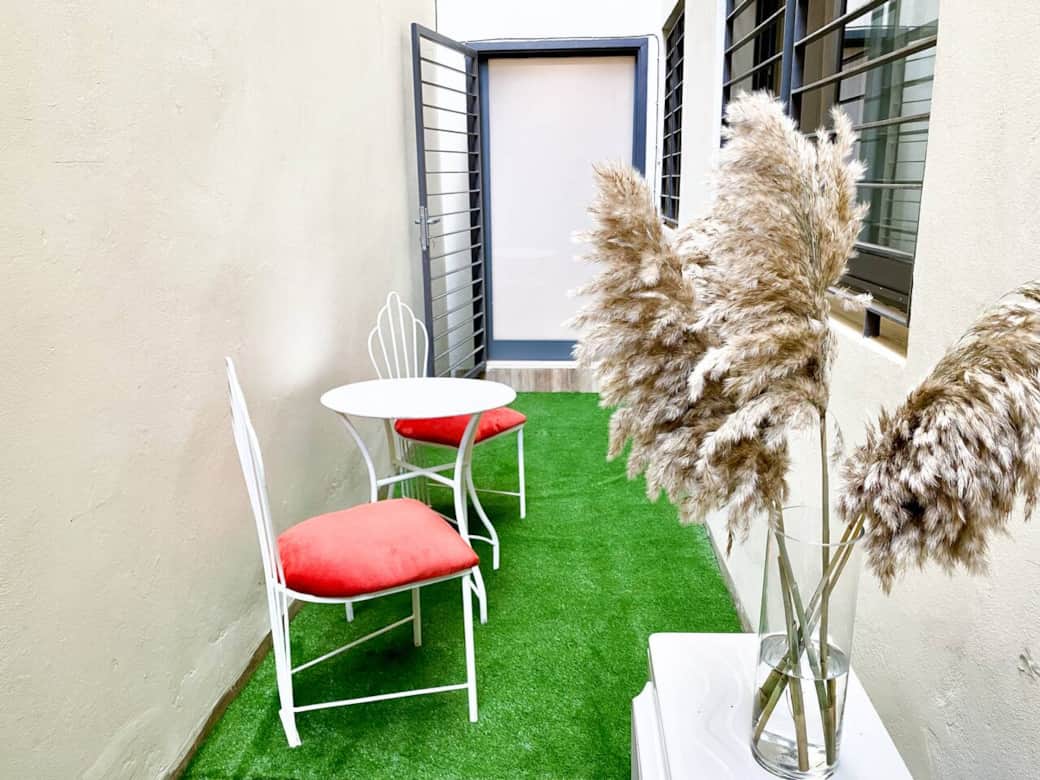 Relax and unwind on our inviting patio, ideal for enjoying morning coffee or romantic candlelight dinners. Relax and unwind on our inviting patio, ideal for enjoying morning coffee or romantic candlelight dinners.