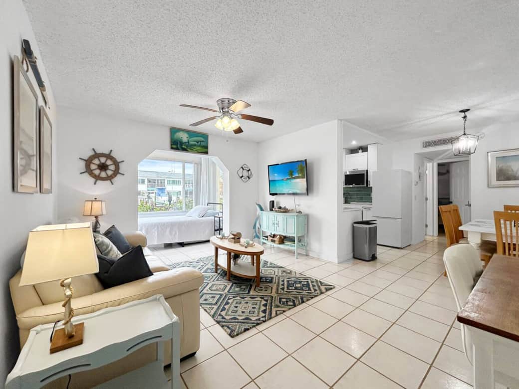 Living room with Roku tv and sitting/relaxing sunroom Living room with Roku tv and sitting/relaxing sunroom