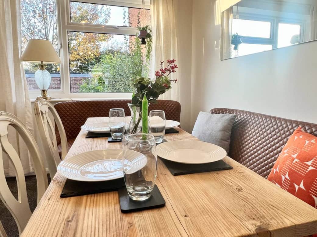 Dining Area - inviting space with chairs and a table for four, perfect for meals and laughter.