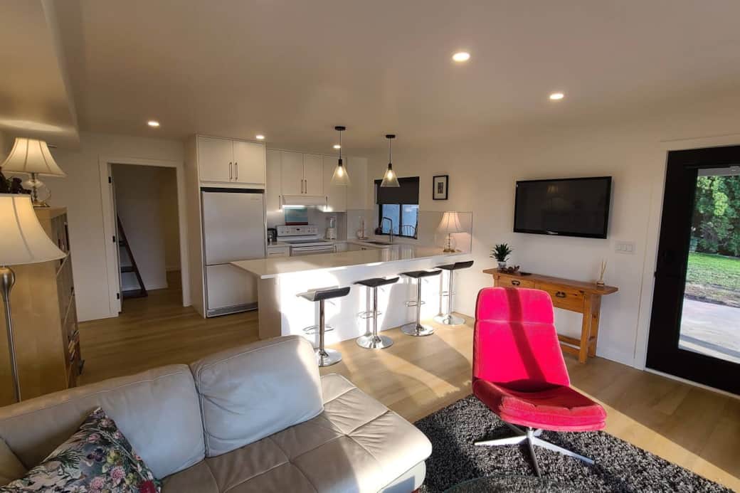 A two bedroom, fully contained walk-out suite with a full kitchen and full laundry. 