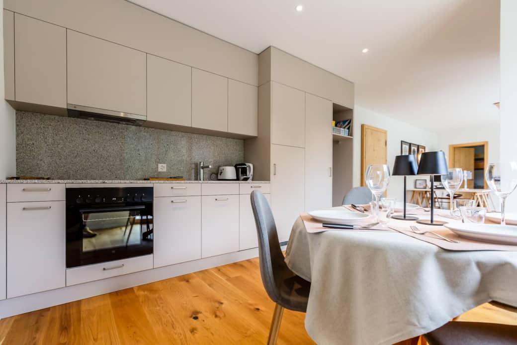 Fully equipped kitchen with modern appliances — perfect for cooking up a mountain-view breakfast or a cozy dinner.
