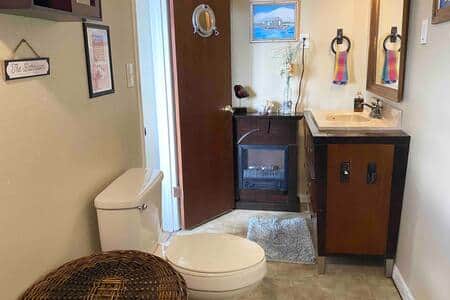 Ensuite bathroom stocked with towel sets and essentials.  