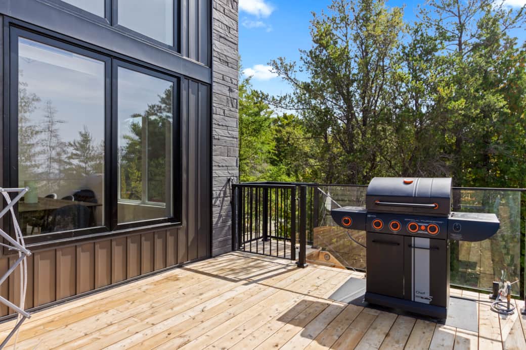 BBQ with Stairs Leading to Beach