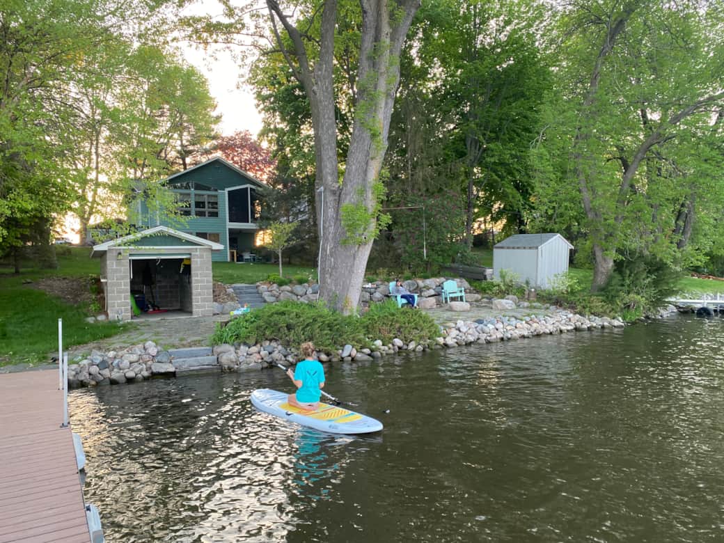Shoreline, fish house, lake area sitting area and paddle board (free)