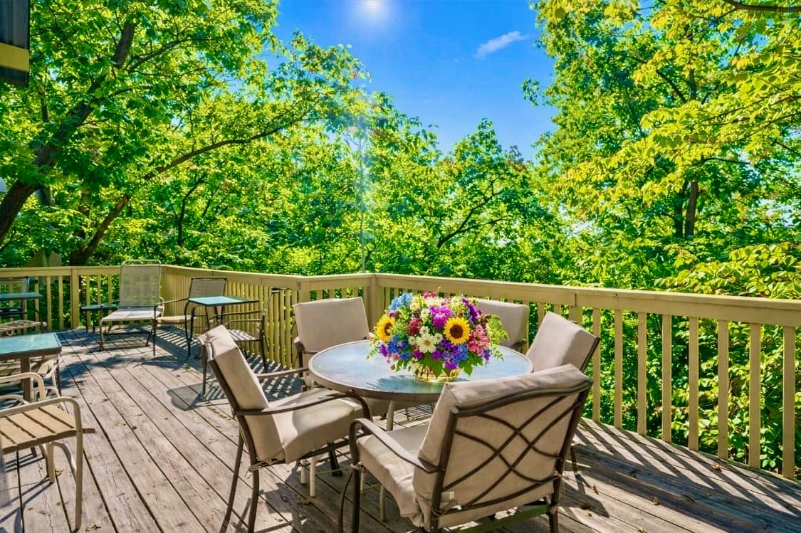 view from the main deck outside the greatroom with outdoor grill